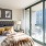 a bedroom with a large window